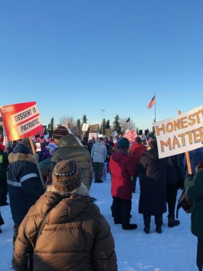 Picture of rally with ACLU signs