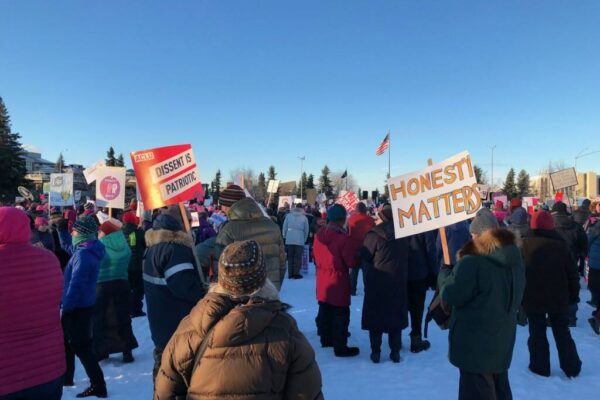 Picture of rally with ACLU signs