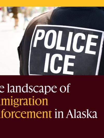 Immigration enforcement in Alaska with picture of back of ICE officer