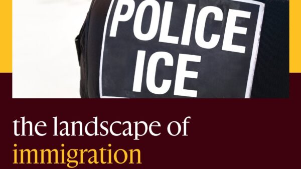 Immigration enforcement in Alaska with picture of back of ICE officer