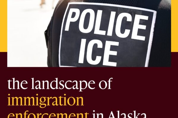 Immigration enforcement in Alaska with picture of back of ICE officer