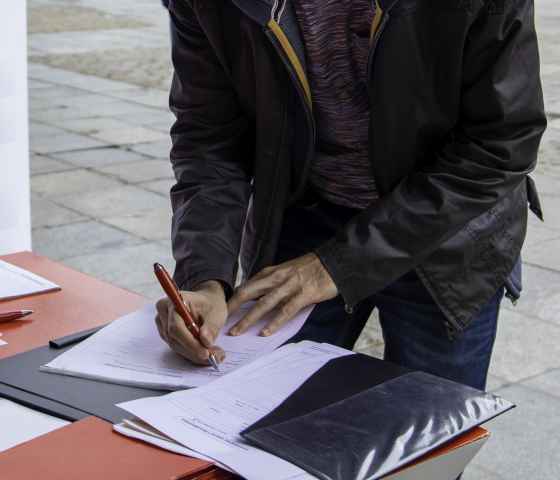 Person taking action by signing petition